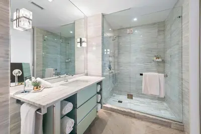 a bathroom with a sink and a shower at 2B Ocean View Private Residence at South Beach - 804 in Miami Beach