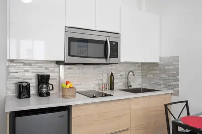 a kitchen with a microwave and a sink at Lovely condo in Miami Beach in Miami Beach