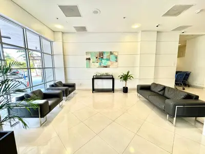 a lobby with couches and a table in a building at Condominium Sunny Isles Ocean Reserve in Sunny Isles Beach