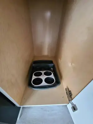 a small stove in a box in a room at West Brickell APT #1 Free Parking-Family Friendly in Miami