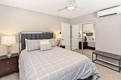 a bedroom with a bed and a ceiling fan at WiltonPlex A in Fort Lauderdale