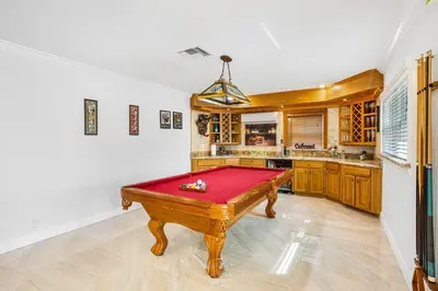 a room with a pool table in it at Villa Fiesta - Celebrate Dreams Create Memories in Southwest Ranches