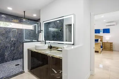 a bathroom with a sink and a shower at Villa Fiesta - Celebrate Dreams Create Memories in Southwest Ranches