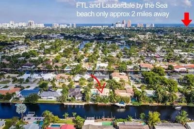 an aerial view of a resort with a city at Wilton on the water courtyard and Heated Pool in Fort Lauderdale
