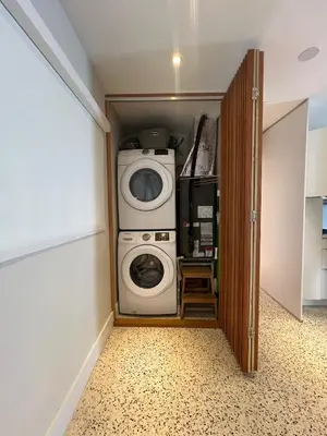 a laundry room with a washer and dryer at Cozy house close Brickell in Miami