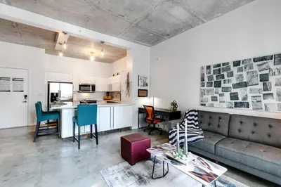 a living room with a couch and a kitchen at Super convenient 1br apartment in Downtown 4 p 1708 in Miami