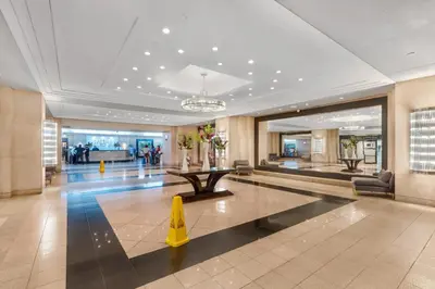 a lobby with a yellow cone in a building at The Grand Wonder in Miami