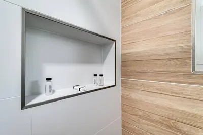 a mirror on a wall in a bathroom at Miami studio apartment, Very centric, Fast Wi-Fi V4 in Miami