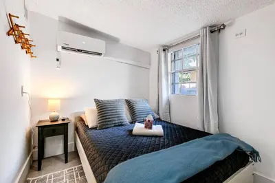 a bedroom with a bed and a window at Swinging London Studio 3 people V6 in Miami