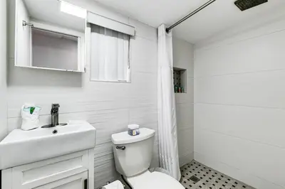a bathroom with a toilet and a sink and a shower at Swinging London Studio 3 people V6 in Miami