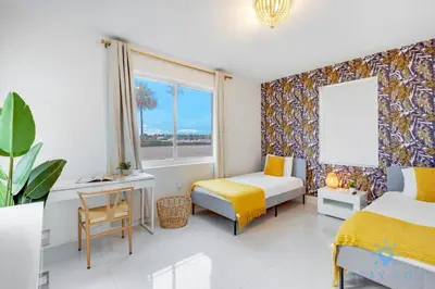 a bedroom with two beds and a window at Hollywood Broadwalk Haven - Free Parking in Hollywood