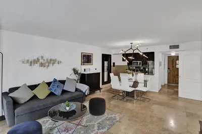 a living room with a couch and a table at Superb Private unit Perfectly Located In Brickell in Miami