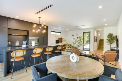 a dining room and kitchen with a table and chairs at Modern Miami Home with Pool 1 Mi to Design District! in Miami