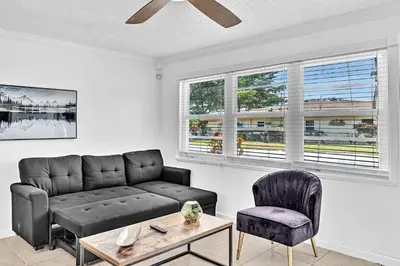 a living room with a couch and a table at 3 Bedroom Villa In F Lauderdale Casino & Beach in Fort Lauderdale