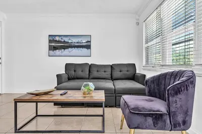 a living room with a couch and a table at 3 Bedroom Villa In F Lauderdale Casino & Beach in Fort Lauderdale