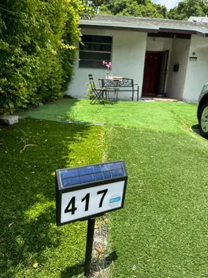 a thermometer in the yard of a house at Beds & Sheets DOWNTOWN in Miami