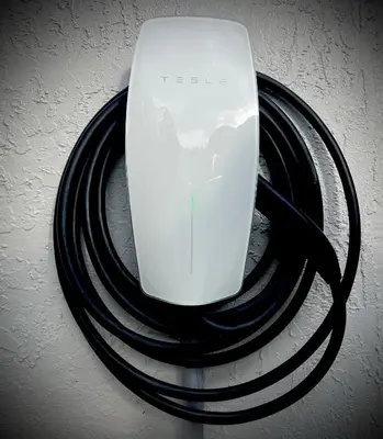 a white computer mouse sitting on top of a black wire at Miami Getaway Heated Pool Villa with Mini Golf & BBQ in Miami