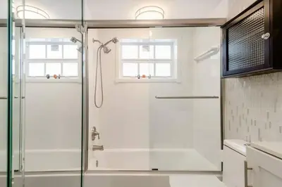 a bathroom with a shower with a glass door at Perfect Beach Escape 1BD/1Bath Close to Everything in Fort Lauderdale