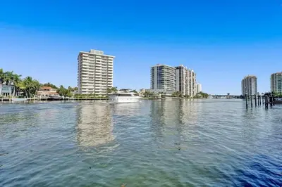 a view of a large body of water with buildings at Vistamar Waterfront Beach Abode -Walk to the Beach in Fort Lauderdale