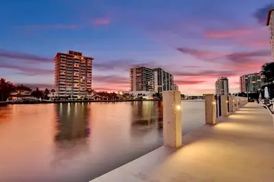 a view of a river with buildings in the background at Vistamar Waterfront Beach Abode -Walk to the Beach in Fort Lauderdale