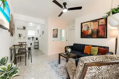 a living room with a couch and a table at Little Havana 1BR Apt w Parking in Miami