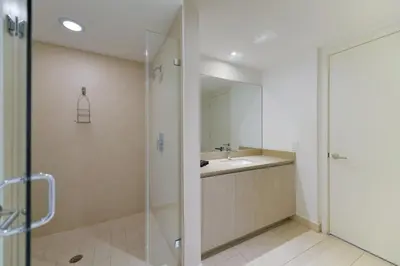 a bathroom with a shower and a sink at Beachside Condo with a Mesmerizing Ocean View in Hollywood
