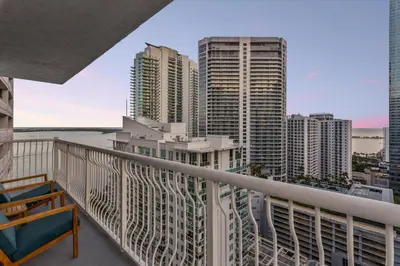 a balcony with a view of the city at myClub at Brickell Bay in Miami