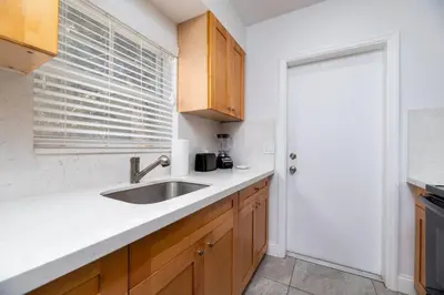 a kitchen with a sink and a window at Bayshore Breeze Free Parking 3 in Fort Lauderdale