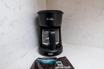 a black coffee maker sitting on a counter at Bayshore Breeze Free Parking 3 in Fort Lauderdale