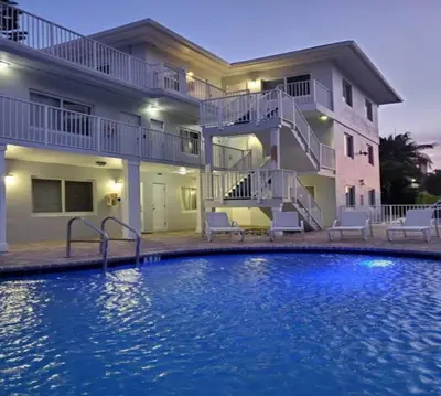 a large swimming pool in front of a house at Bayshore Breeze 6 in Fort Lauderdale