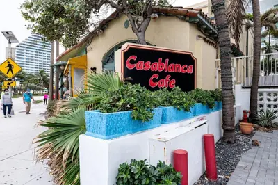 a sign for a casablanca cafe on the side of a building at Ocean Breeze Paradise Apt 5A in Fort Lauderdale