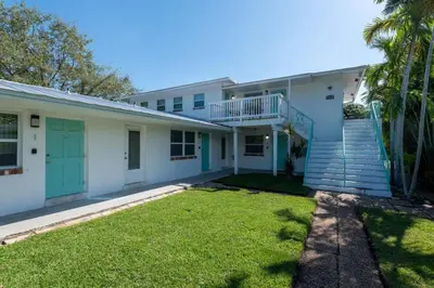 a house with a lawn in front of it at Short Walk to Wilton Drive Apt5 in Fort Lauderdale