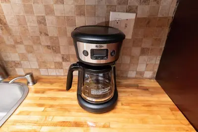 a coffeemaker sitting on top of a counter at Just Off Wilton Drive Apt 6 in Fort Lauderdale