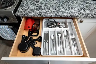 a drawer filled with utensils in a kitchen at Comfy Condos at Middle River Apt 3 in Fort Lauderdale