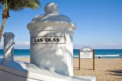 a large white object on the beach with a sign at Rustic Retreats Spacious 1BR For 4 guests In The Heart of Fort Lauderdale in Fort Lauderdale