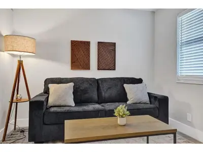 a living room with a couch and a coffee table at Rustic Retreats Modern 1BR for 4 guests in the heart of Fort Lauderdale in Fort Lauderdale