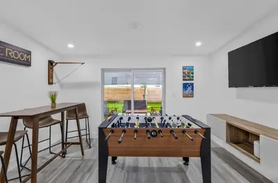 a game room with a foos ball on a table at Modern villa in Design District ! in Miami