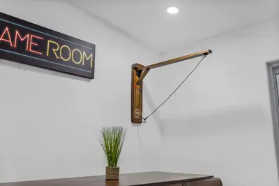 a sign that reads one room hanging on a wall at Modern villa in Design District ! in Miami