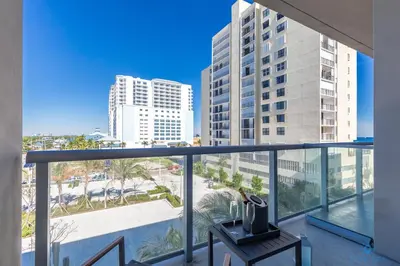 a balcony with a view of a city at Costa Hollywood Beach in Hollywood