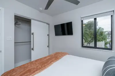 a living room with a couch and a window at New! Miami & Calle Ocho Simpson's Funhouse! in Miami