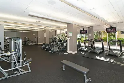 a gym with a lot of cardio equipment in it at Apartment on the beach Tides Hollywood Beach 5th floor U in Hollywood