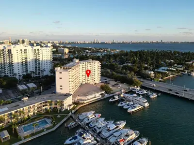 an aerial view of a marina with boats in the water at La Marinita - Marina Views Pool Parking Location in Miami Beach