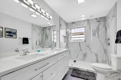 a bathroom with a sink toilet and a shower at Casa Azul 4Bed 2Bath Home with Heated Pool & Spa 1304 in Hollywood
