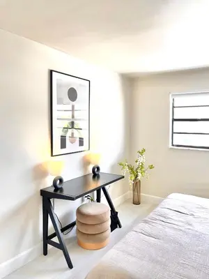 a bedroom with a desk and a bed at Zen Vibe on the Beach /700 SqFt in Miami Beach