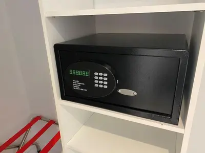 a microwave oven in a shelf in a kitchen at Beachfront Miami Apartment with Full Kitchen -A in Hallandale Beach