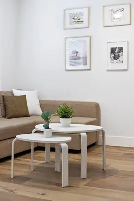 a living room with a couch and a coffee table at Charming Apartment near Las Olas Blvd in Fort Lauderdale