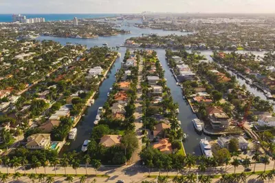 an aerial view of a city with a river and houses at Charming Apartment near Las Olas Blvd in Fort Lauderdale