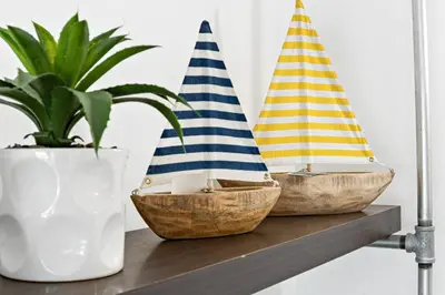 three wooden bowls sitting on a shelf with a plant at Las Olas Blvd Exclusive Apt with waterview in Fort Lauderdale