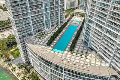 an aerial view of a large building with a swimming pool at 28th Floor Icon Brickell Penthouse with City Views in Miami