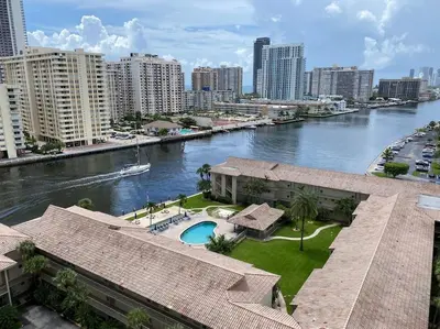 a view of a river in a city with buildings at Compact & Comfy, BeachWalk Studio for Small Groups in Hallandale Beach